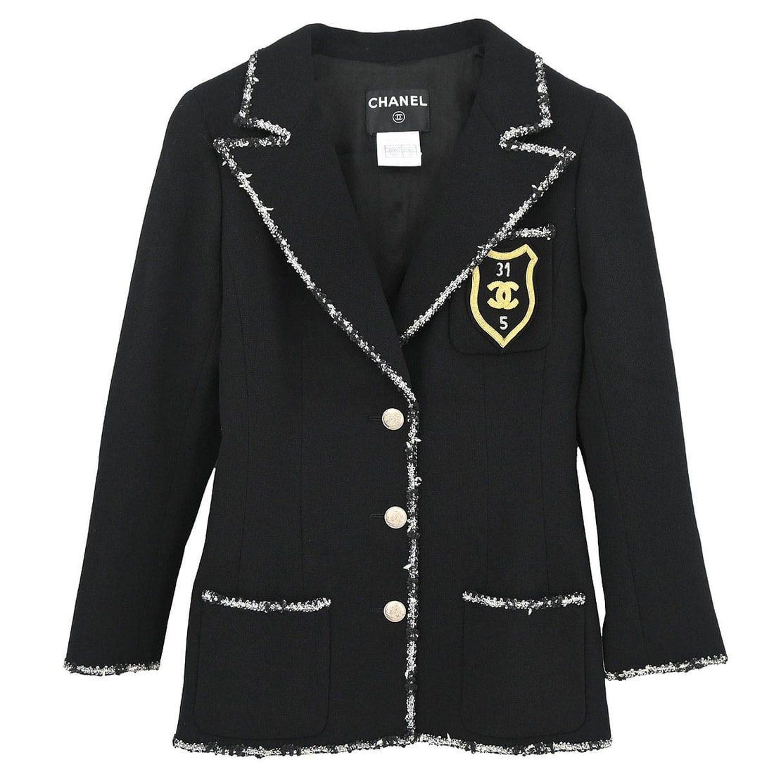 Black Wool Chanel Logo Accent Mid-Length Single Breasted Jacket FR 34: Black Wool Chanel Logo Accent Mid-Length Single Breasted Jacket FR 34 This Chanel emblem single breasted jacket features a mid-length cut and is crafted from 100% wool in black. Designed for women, it