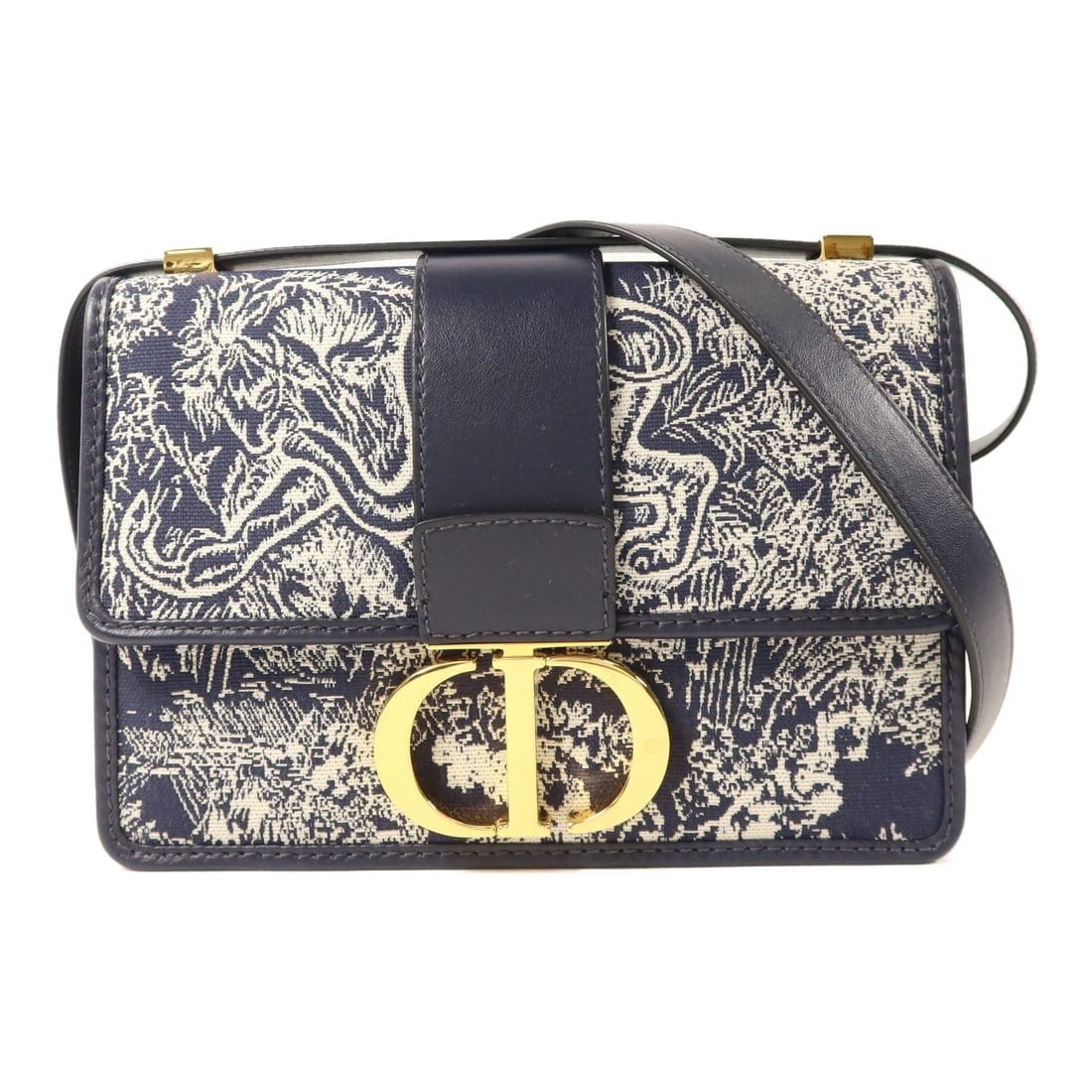 Dior 30 Montaigne Navy Canvas Shoulder Bag Gold Hardware: Dior 30 Montaigne Navy Canvas Shoulder Bag Gold Hardware This Christian Dior 30 Montaigne shoulder bag features a navy canvas exterior and gold-tone hardware. Designed for women, it offers a regular s