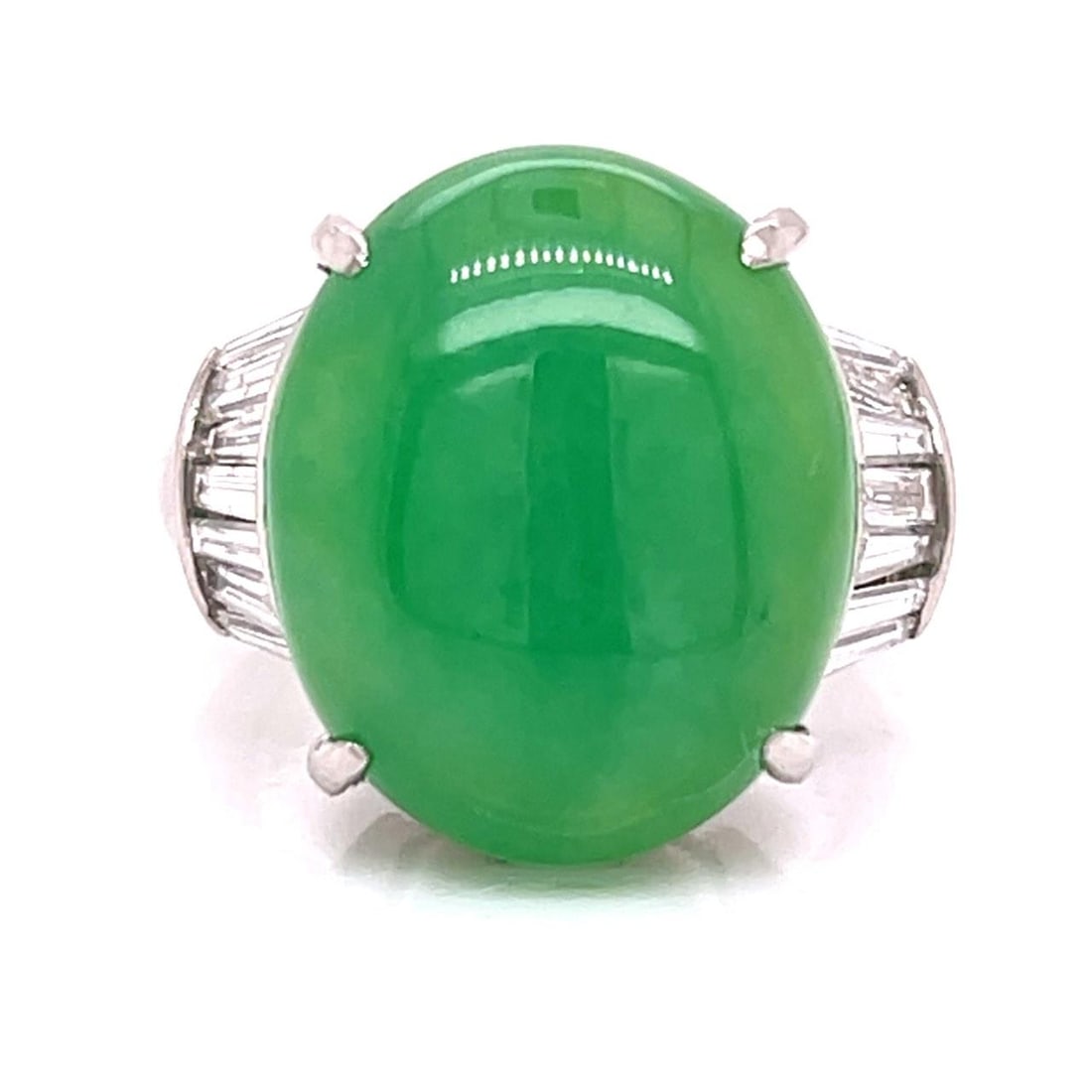 GIA Certified Platinum Ring Featuring 15.44 Carat Jade and Diamond Accents: GIA Certified Platinum Ring Featuring 15.44 Carat Jade and Diamond Accents This platinum ring features a GIA certified jade center stone weighing 15.44 carats, accompanied by 14 baguette diamonds tota