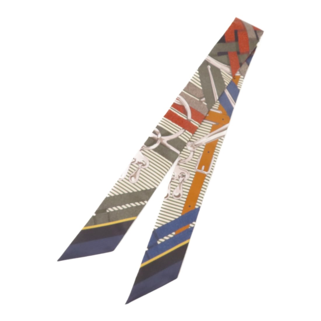 Hermes Silk Twilly Multicolor Women Scarf: Hermes Silk Twilly Multicolor Women Scarf This Hermes Twilly scarf is crafted from luxurious silk and features a vibrant multicolor design. Made in France, it is designed for women and offers a pristi