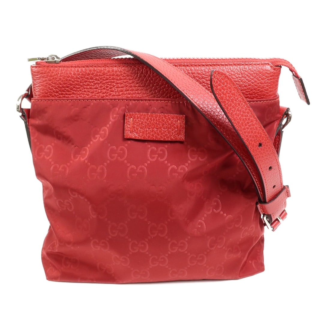 Red Nylon Gucci GG Shoulder Bag 510339: Red Nylon Gucci GG Shoulder Bag 510339 This GUCCI shoulder bag features a sleek red nylon exterior and is designed for women. Crafted in Italy, the bag offers a compact yet practical size, making it s
