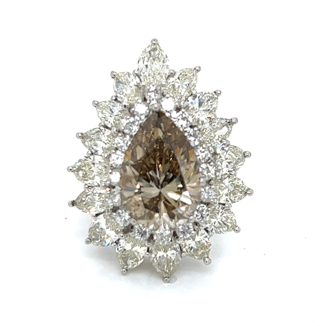 Platinum 6.58 Ct GIA Certified Pear Diamond Ring with 34 Additional Diamonds: Platinum 6.58 Ct GIA Certified Pear Diamond Ring with 34 Additional Diamonds This exquisite platinum ring showcases a stunning GIA Certified 6.58 Ct. pear-shaped diamond, featuring a natural, fancy da