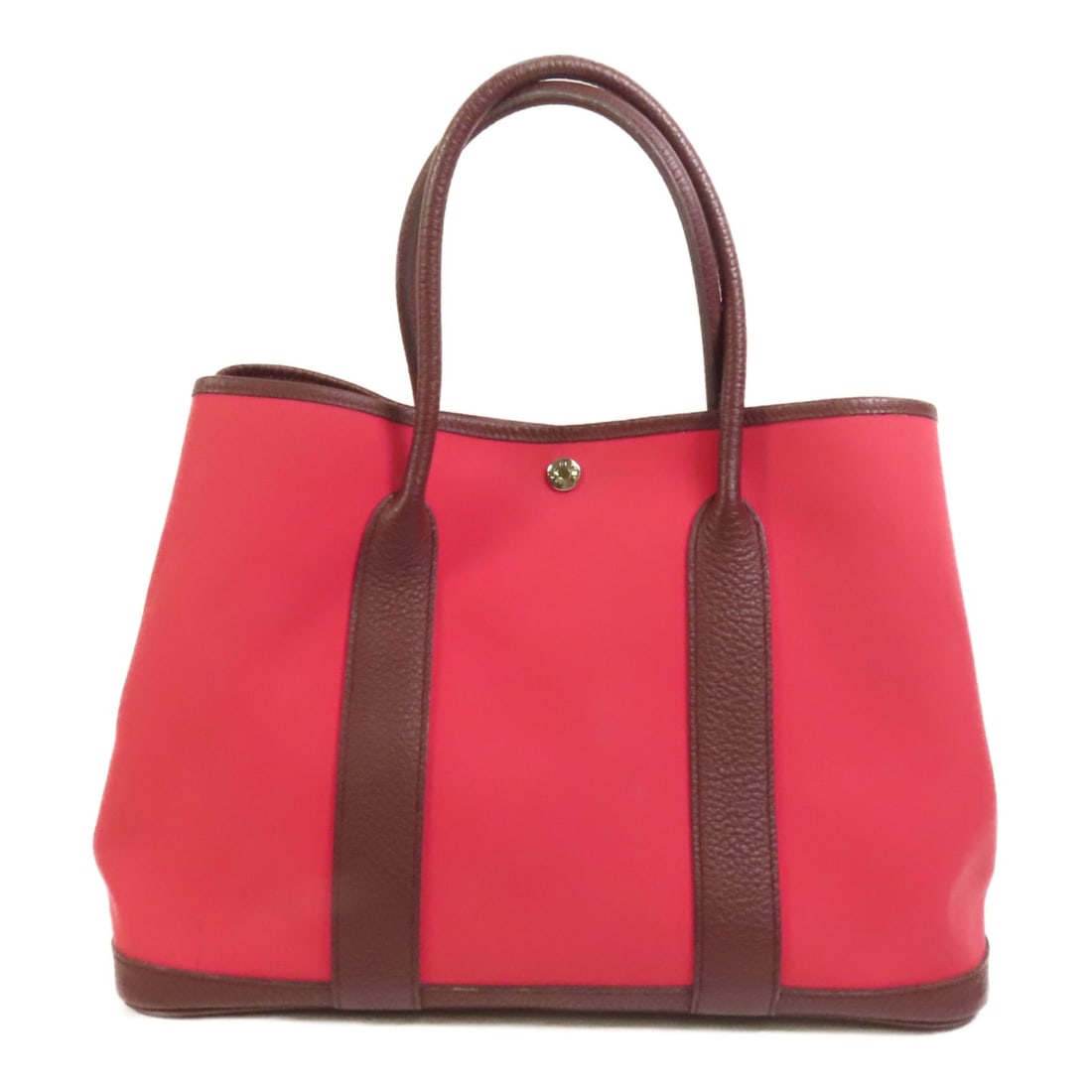 Hermes Garden Party PM Bordeaux Canvas Tote with Palladium Hardware: Hermes Garden Party PM Bordeaux Canvas Tote with Palladium Hardware This Hermes Garden Party PM Tote Bag features a canvas exterior in Bordeaux red and palladium hardware. The tote offers a spacious m