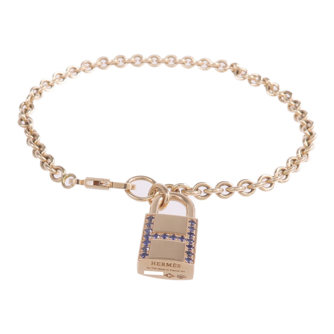 Amulettes Cadenas 18K Rose Gold Sapphire Bracelet by Hermes: Amulettes Cadenas 18K Rose Gold Sapphire Bracelet by Hermes This Hermes Amulettes Cadenas bracelet is crafted from 18K pink gold and features a blue sapphire as its main stone. Designed for women, it 
