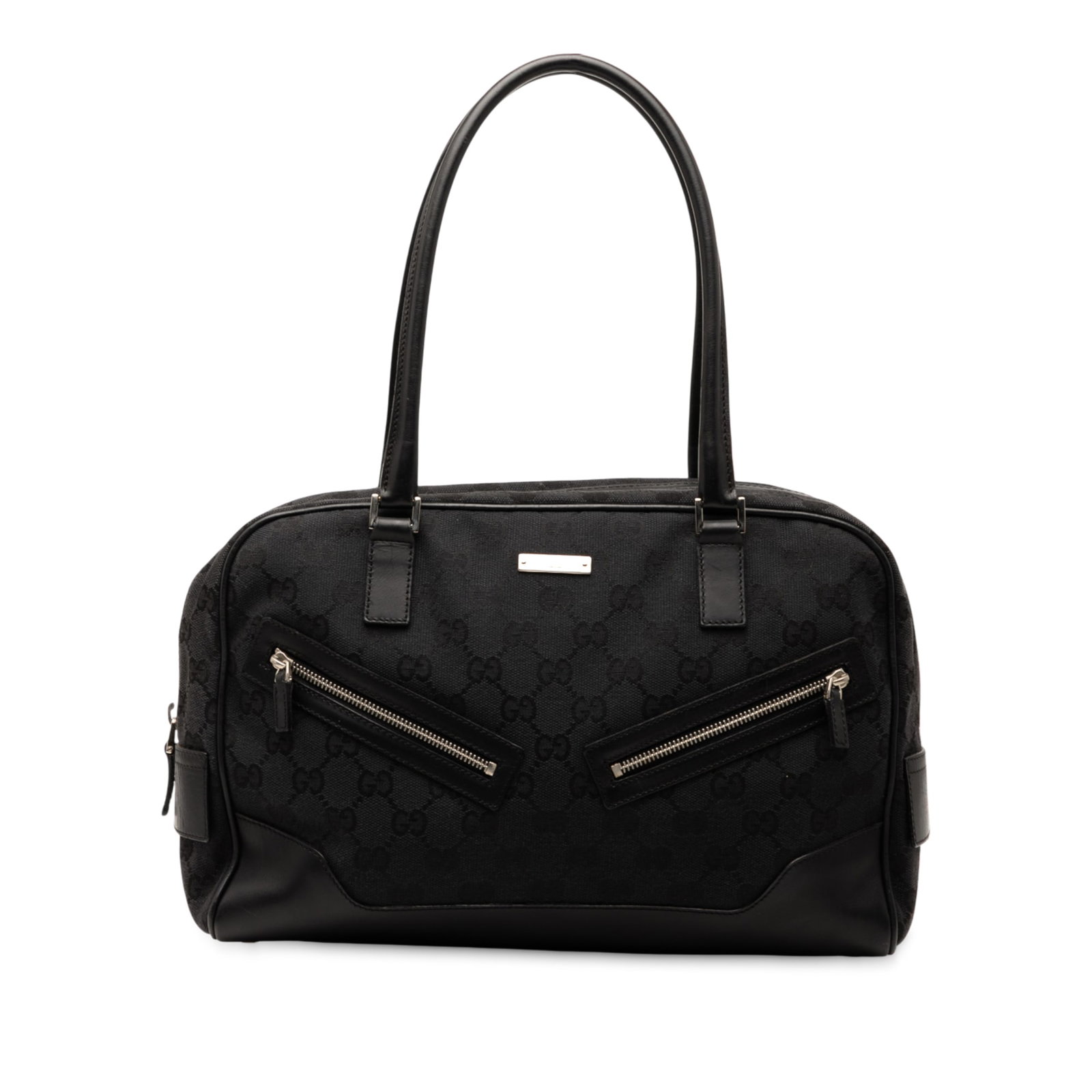 Black GG Canvas Shoulder Bag by Gucci with Leather Trim: Black GG Canvas Shoulder Bag by Gucci with Leather Trim This Gucci GG Canvas Shoulder Bag features a canvas body with leather trim, rolled leather straps, a top zip closure, exterior zip pockets, and 