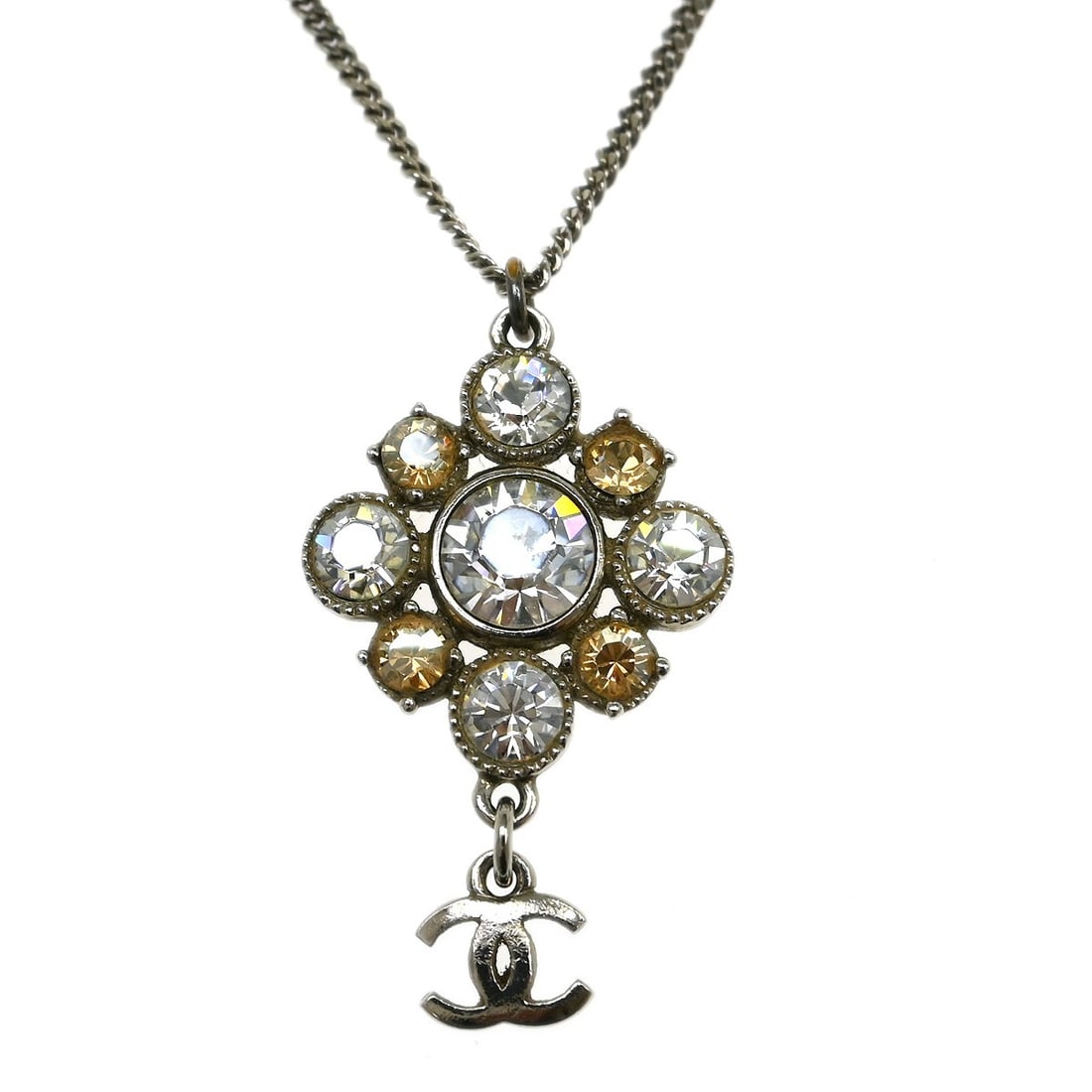 CHANEL silver plated chain pendant necklace rhinestone 09V: CHANEL silver plated chain pendant necklace rhinestone 09V This Chanel pendant necklace features a silver-plated chain and pendant adorned with rhinestones. The piece is crafted in France and showcase