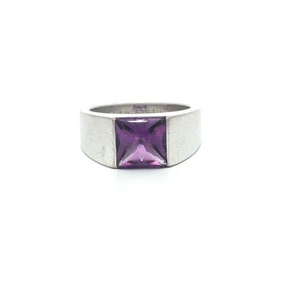 Cartier 1997 Amethyst Cabochon Ring 18k White Gold Size 53: Cartier 1997 Amethyst Cabochon Ring 18k White Gold Size 53 This Cartier ring from 1997 features a cabochon-cut, channel-set natural amethyst in a striking purple hue. Crafted from solid 18k white gold