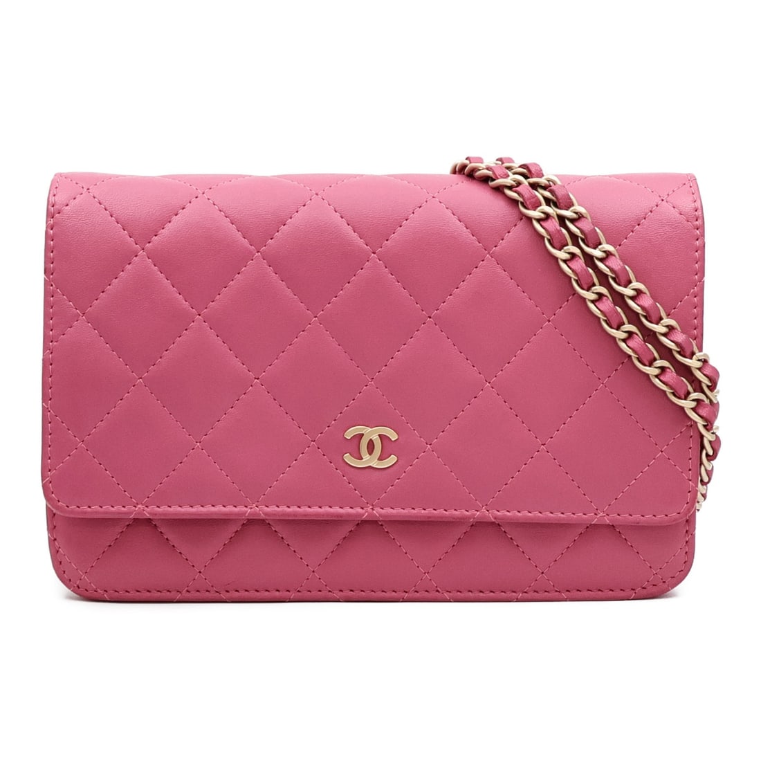Pink Lambskin CHANEL Wallet On Chain Shoulder Bag with Gold Hardware: Pink Lambskin CHANEL Wallet On Chain Shoulder Bag with Gold Hardware This CHANEL Wallet On Chain (WOC) shoulder bag features a classic pink lambskin leather exterior, complemented by the signature CC 