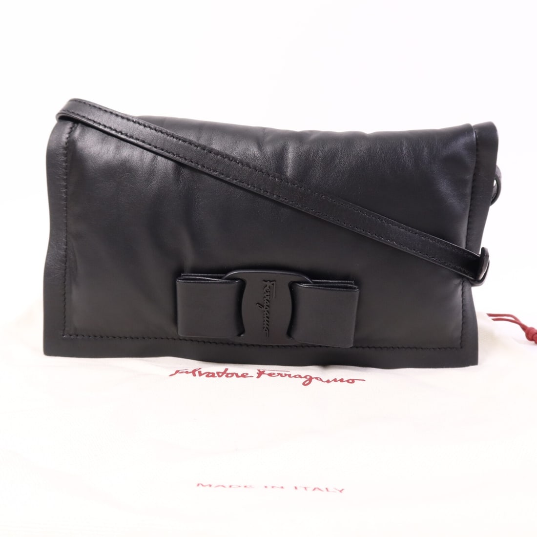 Black Leather Shoulder Bag by Salvatore Ferragamo with Silver Hardware: Black Leather Shoulder Bag by Salvatore Ferragamo with Silver Hardware This Salvatore Ferragamo shoulder bag features a sleek black leather exterior and a classic, compact silhouette. Crafted in Italy