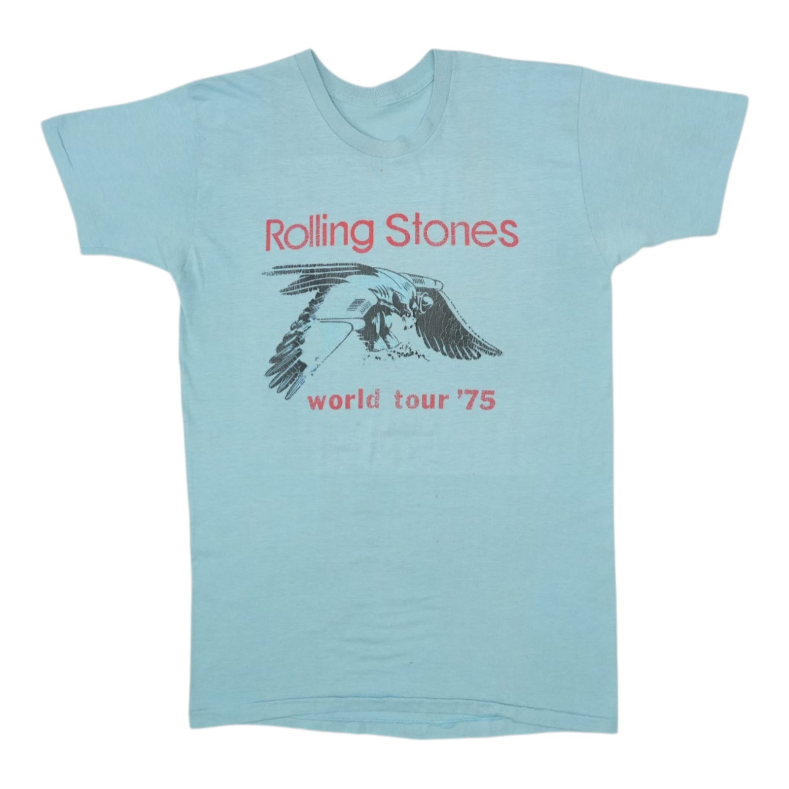 Vintage 1975 Blue Cotton Rolling Stones Tour T-Shirt: Vintage 1975 Blue Cotton Rolling Stones Tour T-Shirt This shirt is an original vintage piece from the 1975 Rolling Stones World Tour. Crafted from 100% cotton, it features a blue color and has no back