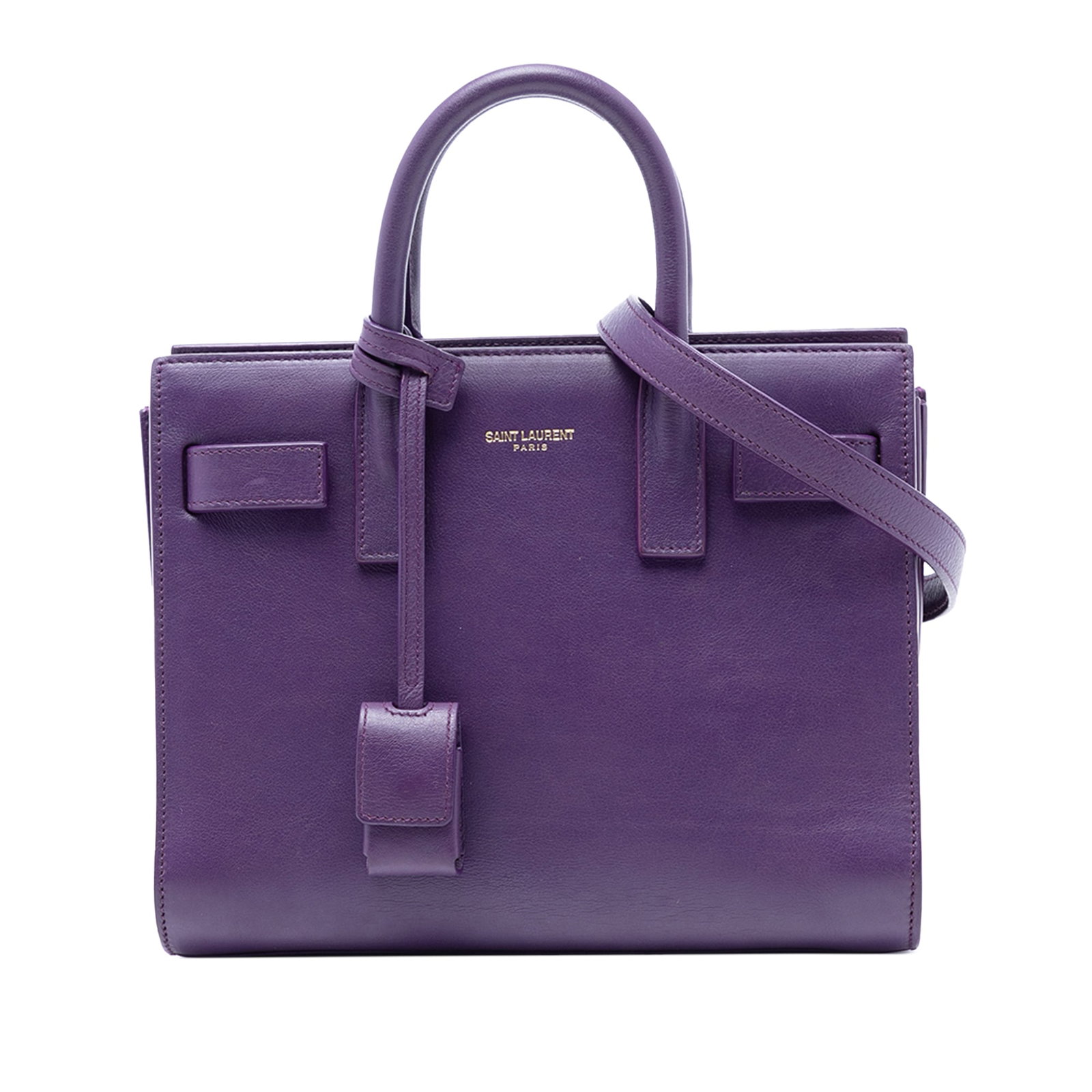 Purple Leather Nano Sac de Jour Bag by Saint Laurent: Purple Leather Nano Sac de Jour Bag by Saint Laurent This Saint Laurent Nano Sac de Jour satchel features a structured leather body in purple, rolled leather handles, a detachable flat leather strap, 