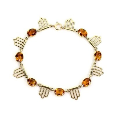 14k Yellow Gold Citrine Link Bracelet 7.25 Inch: 14k Yellow Gold Citrine Link Bracelet 7.25 Inch This bracelet features intricately crafted fancy links in 14k yellow gold, each adorned with a vibrant citrine gemstone. The design combines classic sop