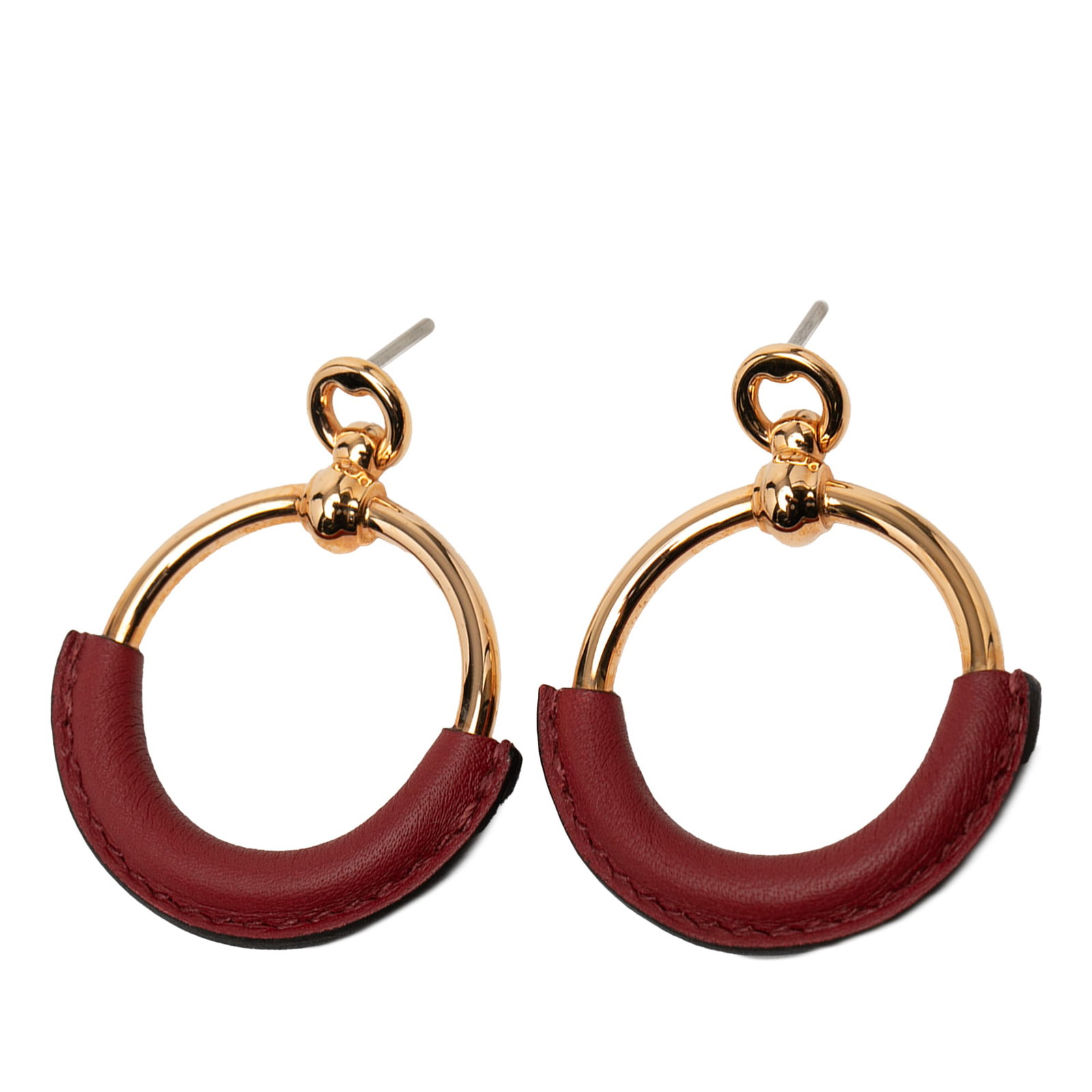 Hermes Swift Leather and Gold Plated Loop Earrings: Hermes Swift Leather and Gold Plated Loop Earrings These Hermes earrings feature gold-plated metal and swift leather, designed in a loop style with push back closures. Minor scratches are present on t