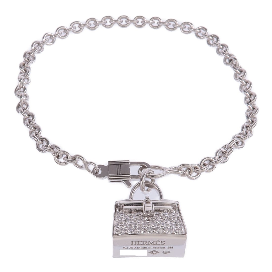 Amulettes Kelly Bracelet in 18K White Gold with Diamond by Hermes: Amulettes Kelly Bracelet in 18K White Gold with Diamond by Hermes This Hermes Amulettes Kelly bracelet is crafted from 18K white gold and features a diamond as the main stone. Made in France, this ele