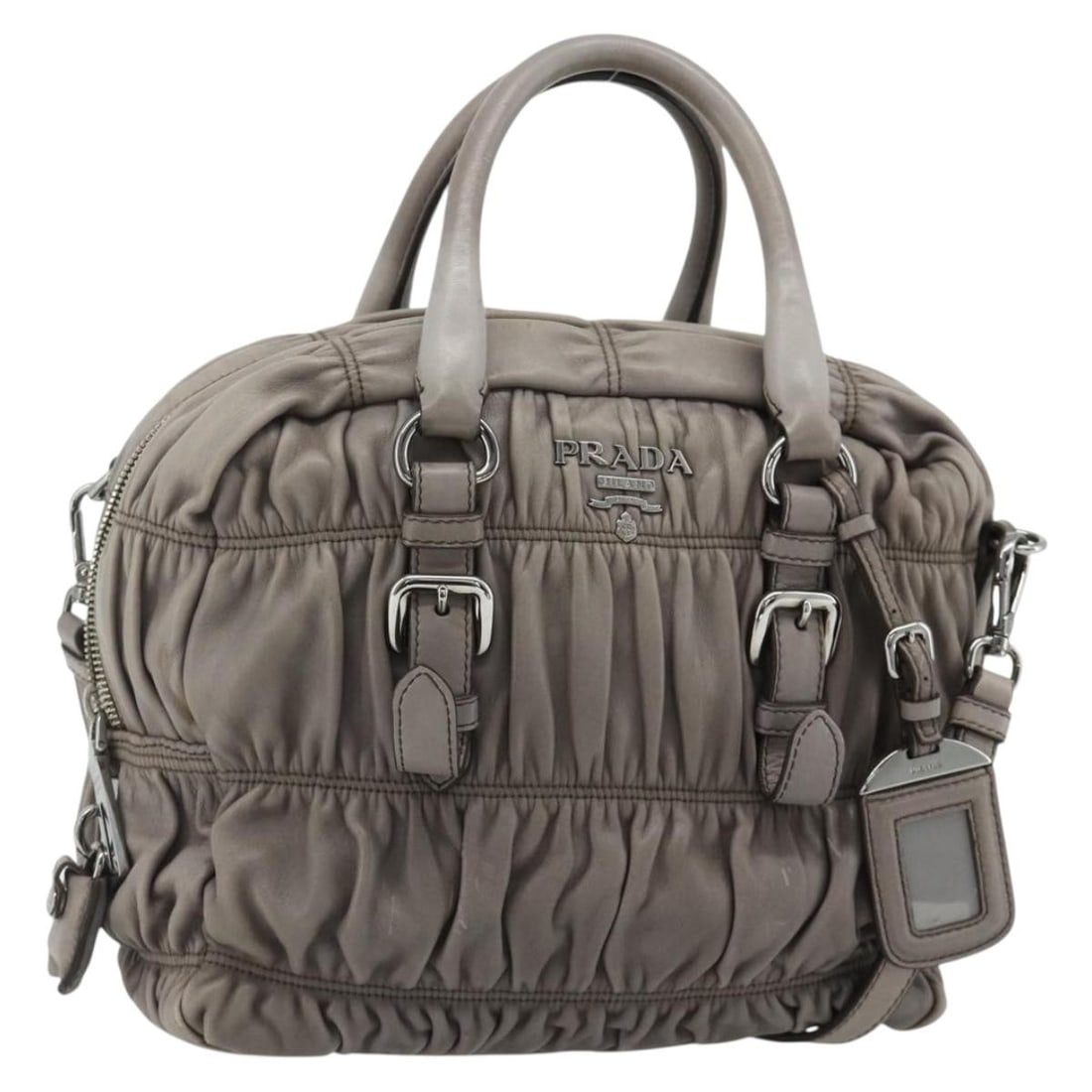 Prada leather gray silver gathered 2way handbag with strap and padlock: Prada leather gray silver gathered 2way handbag with strap and padlock This PRADA gathered leather handbag offers versatile 2-way carrying options with both top handles and a detachable shoulder strap