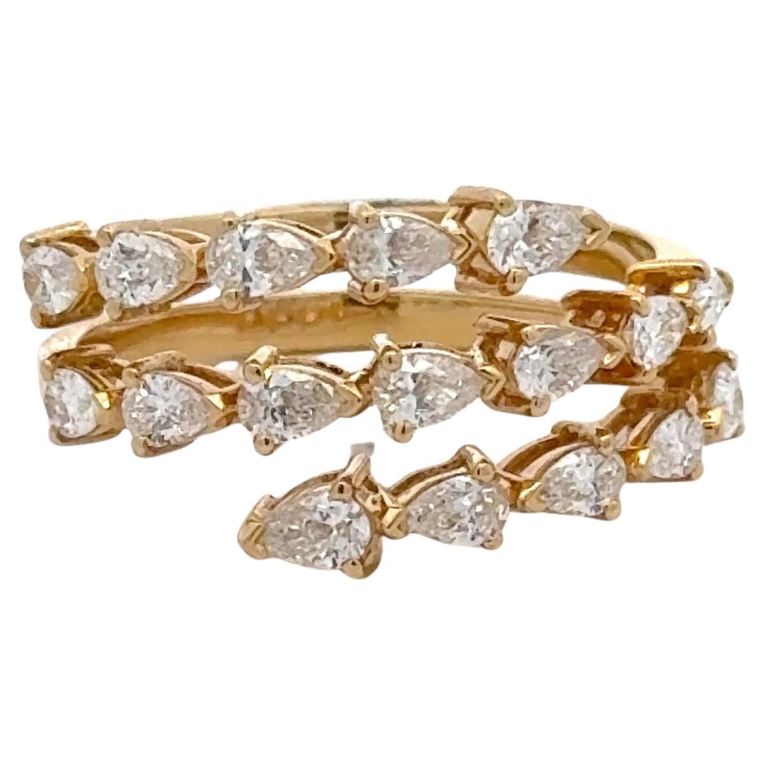 18K Yellow Gold Contemporary Diamond Band Ring 1.36ct F-G VS1 Pear Cut: 18K Yellow Gold Contemporary Diamond Band Ring 1.36ct F-G VS1 Pear Cut This stunning three-row band ring showcases 17 exquisite pear-shaped diamonds, weighing a total of 1.36 carats, set in luxurious 