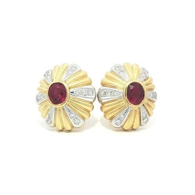 18k Yellow Gold GIA Certified Ruby Diamond Burst Stud Earrings: 18k Yellow Gold GIA Certified Ruby Diamond Burst Stud Earrings Enhance your elegance with these exquisite stud earrings featuring natural rubies and diamonds. Crafted in solid 18k yellow gold with whi