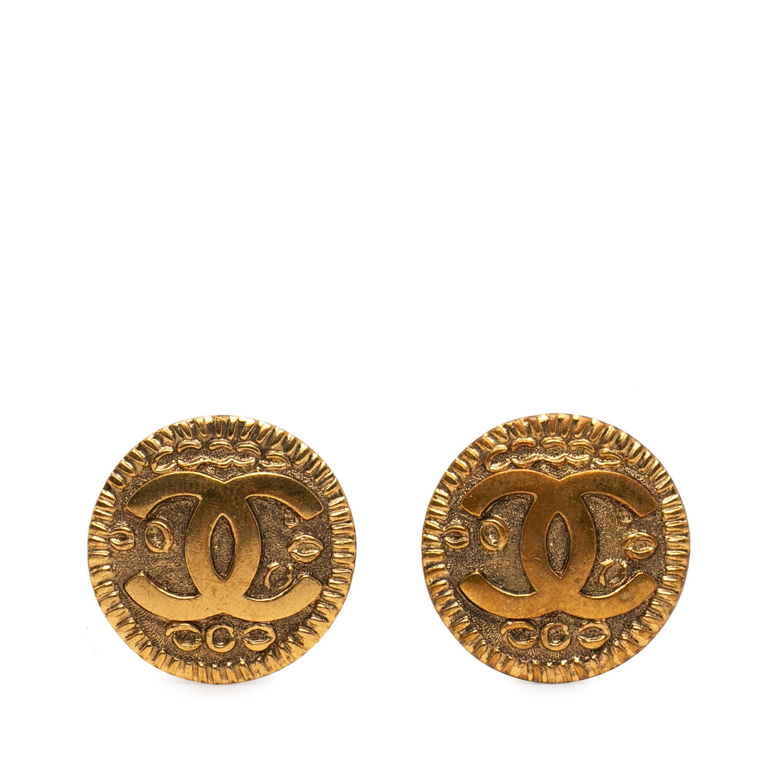 Chanel CC Round Gold Plated Clip Earrings: Chanel CC Round Gold Plated Clip Earrings These Chanel CC round earrings feature gold-plated metal bodies with a classic clip-on closure. The design showcases the iconic Chanel logo and offers a timel