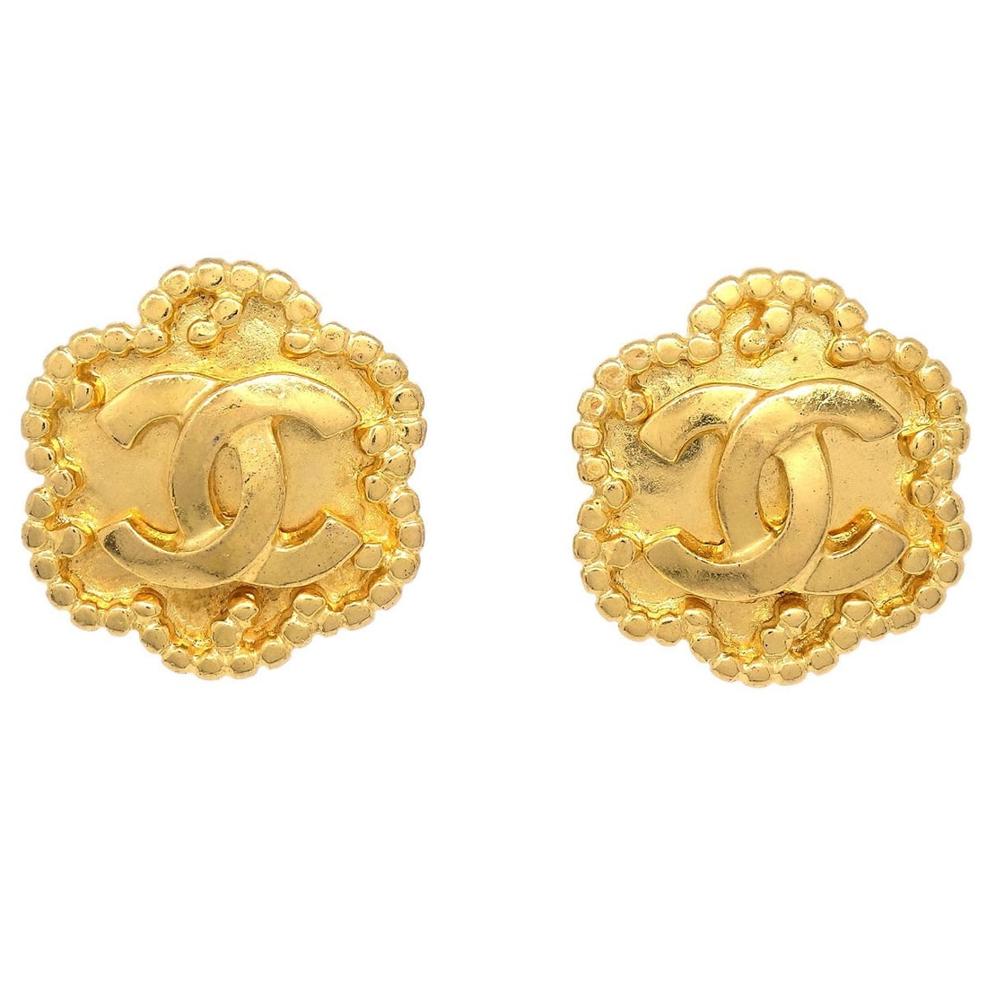Flower Motif Gold Plated Clip-On Earrings by Chanel 96A Collection: Flower Motif Gold Plated Clip-On Earrings by Chanel 96A Collection These Chanel flower-shaped earrings feature a gold-plated finish and a classic clip-on closure. Designed in France, they offer an ele