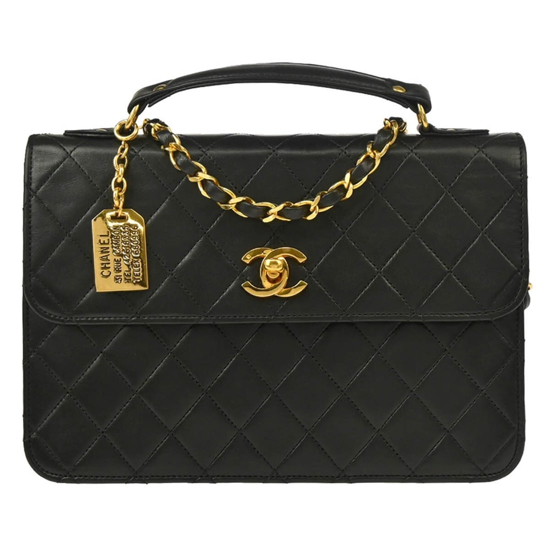 Medium Top Handle Bag Chanel Black Lambskin with Logo Accent: Medium Top Handle Bag Chanel Black Lambskin with Logo Accent This Chanel handbag is crafted from black lambskin and features a top handle design with a non-adjustable strap. Accented with the iconic C