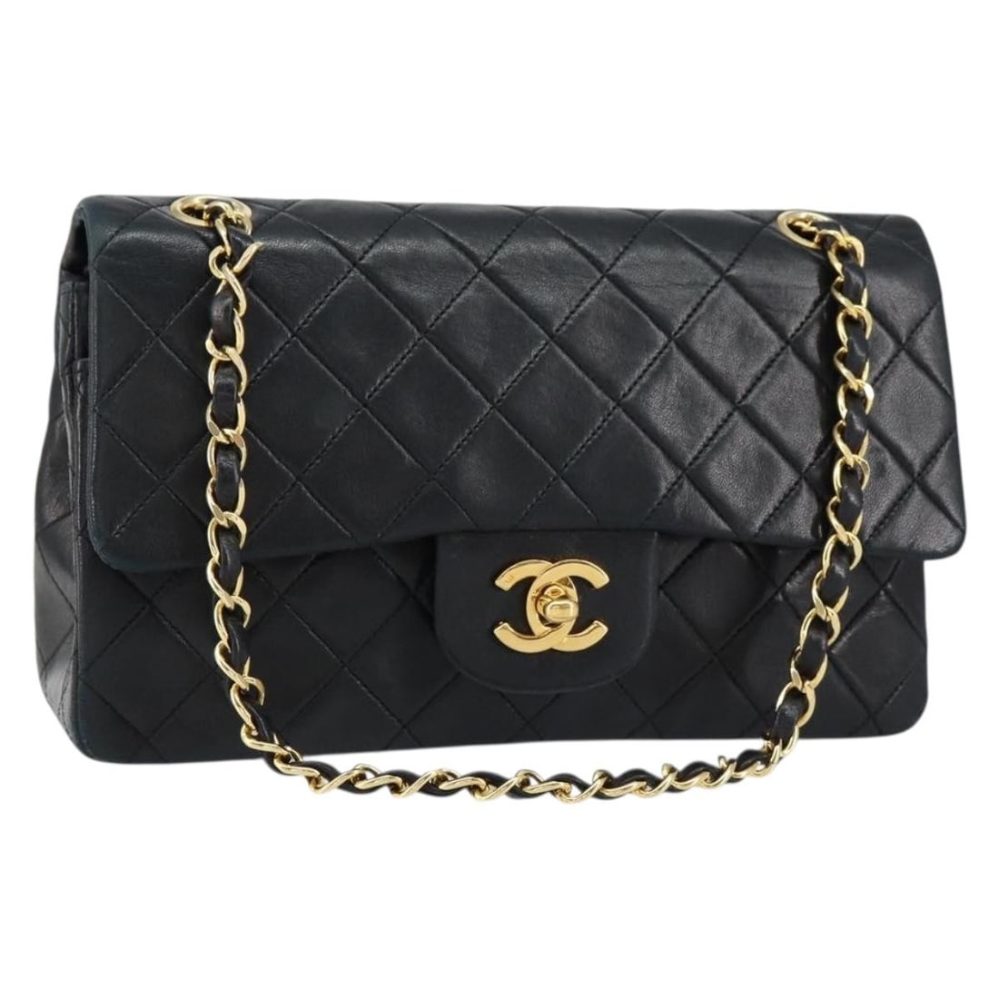 Black Leather Timeless Classic Double Flap Shoulder Bag by Chanel: Black Leather Timeless Classic Double Flap Shoulder Bag by Chanel This Chanel Timeless Classic Double Flap Bag is crafted from black leather and designed for women. The bag features surface rubbing, m