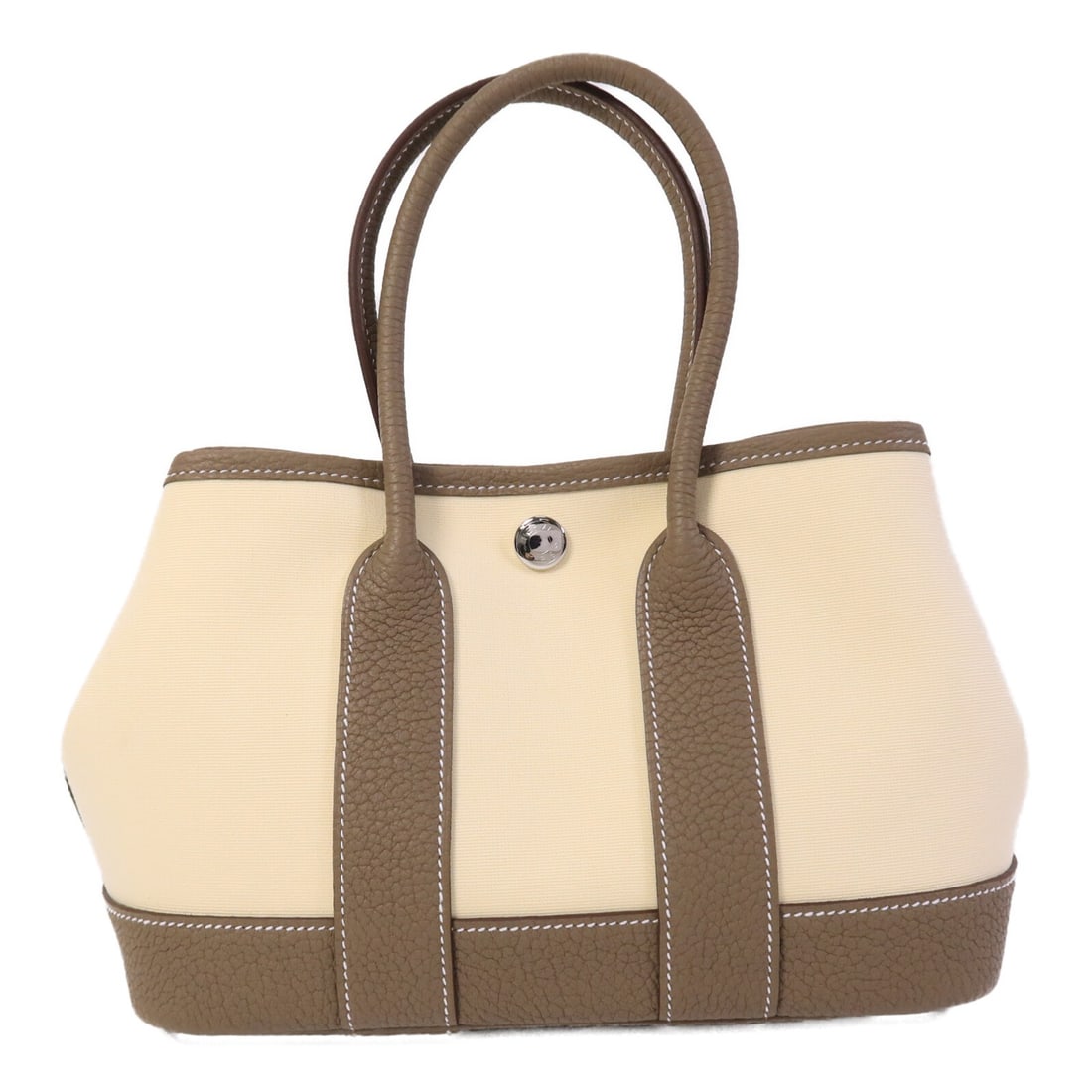 Hermes Mini Garden Party Tote Vanille Etoupe Canvas: Hermes Mini Garden Party Tote Vanille Etoupe Canvas This Hermes Mini Garden Party tote bag features a sophisticated combination of Vanille and Etoupe tones, crafted from durable beige canvas. Designed