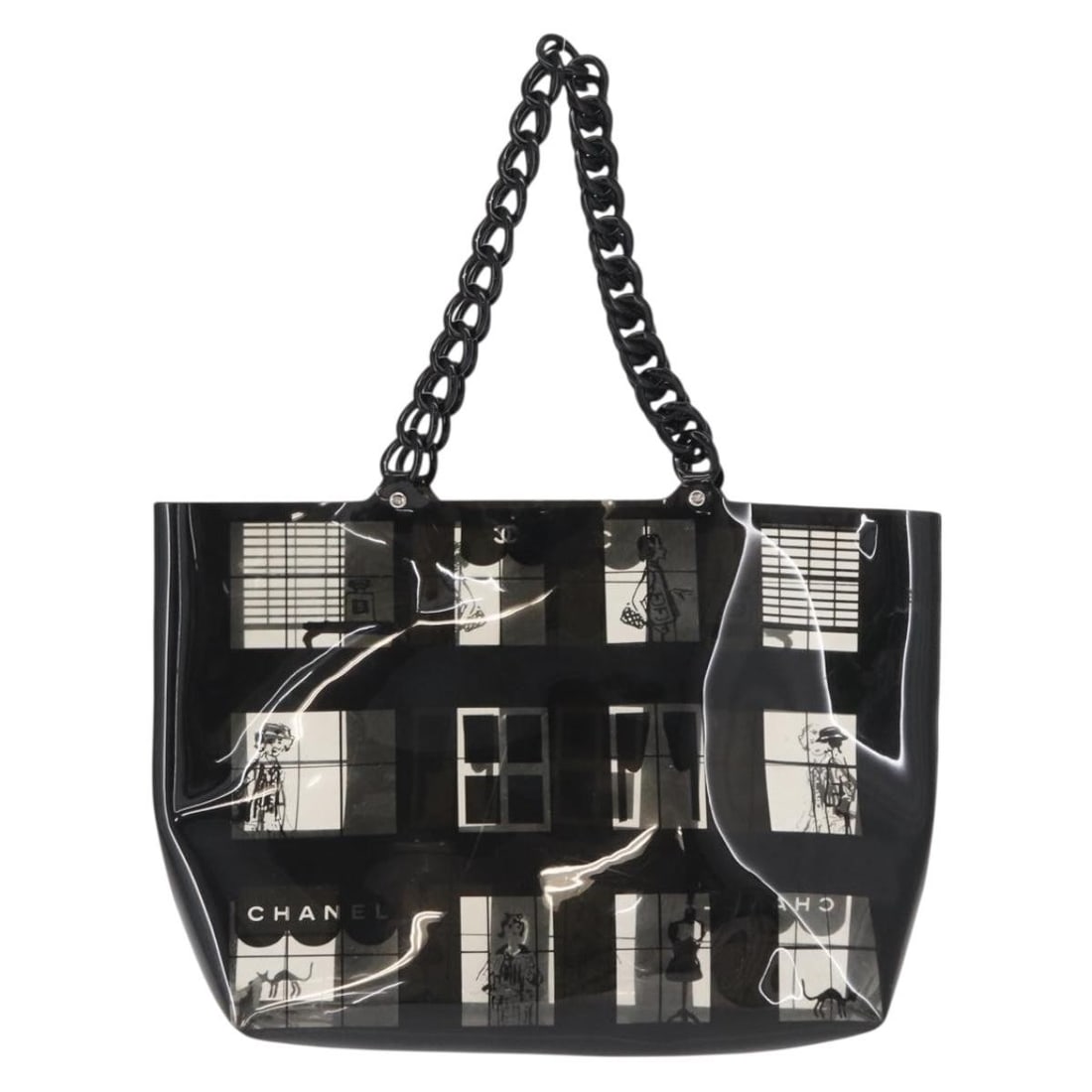 Chanel Coco Window Black Vinyl Tote Bag 32cm by 25cm by 10cm: Chanel Coco Window Black Vinyl Tote Bag 32cm by 25cm by 10cm Chanel Coco Window Tote for women in black printed vinyl. This tote features a plastic construction with signs of wear including outside su