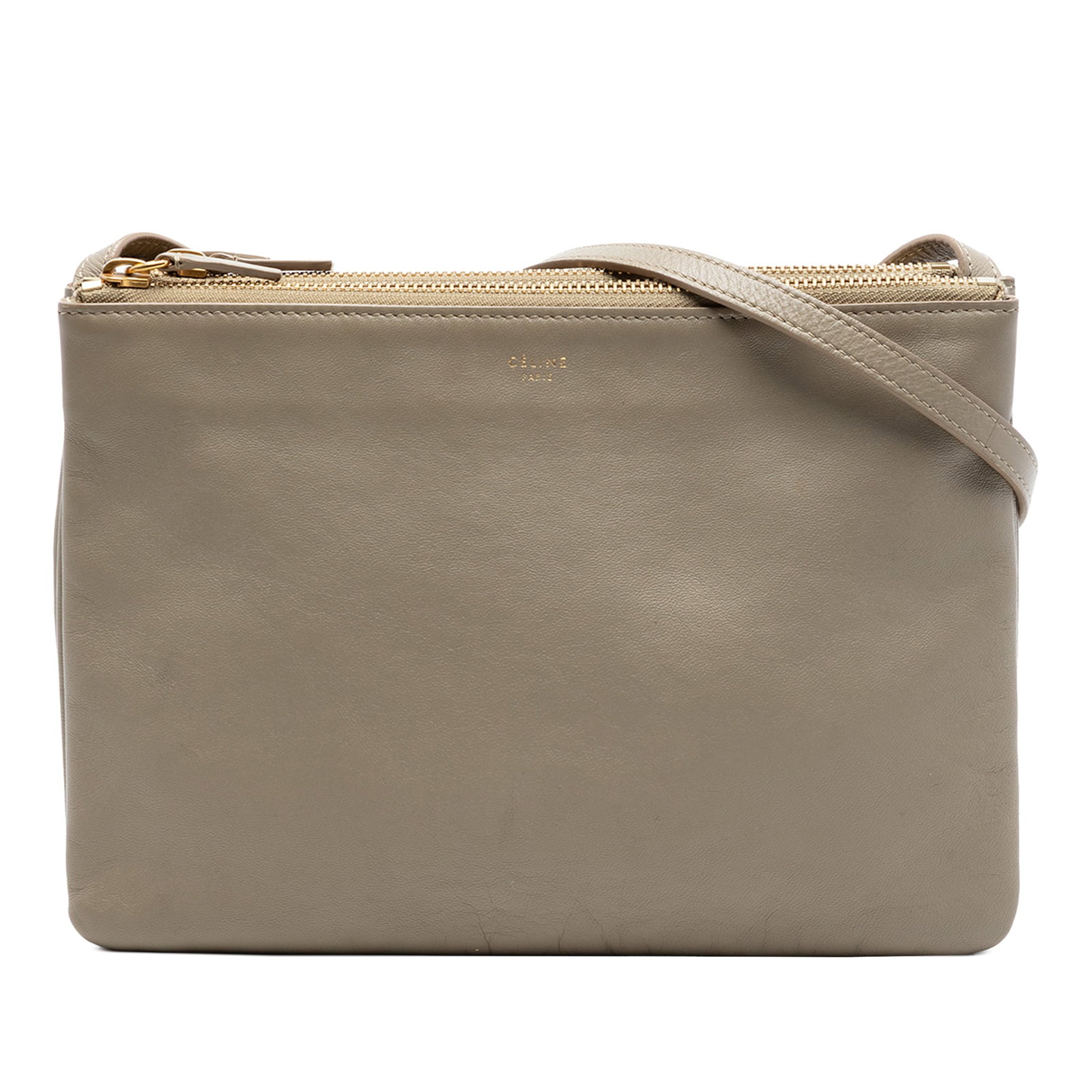 Celine Trio Large Brown Lambskin Leather Crossbody Shoulder Bag: Celine Trio Large Brown Lambskin Leather Crossbody Shoulder Bag This Celine Large Lambskin Trio Crossbody features a lambskin leather body, a flat leather shoulder strap, and triple top zip closures. 