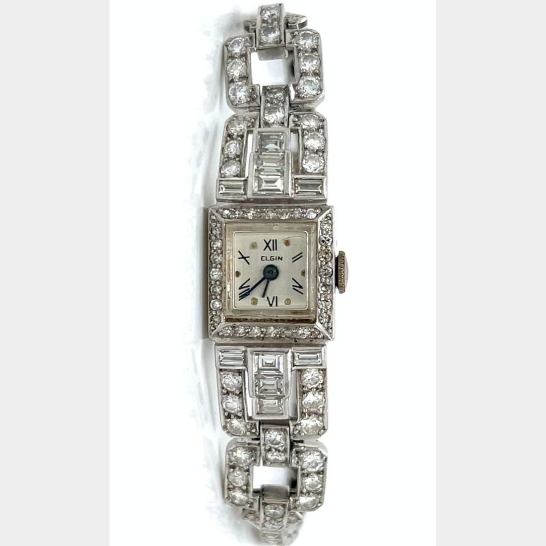 ELGIN Art Deco Platinum Ladies Watch with 100 Diamonds: ELGIN Art Deco Platinum Ladies Watch with 100 Diamonds This exquisite ELGIN Art Deco Ladies Cocktail Watch is crafted in platinum and features a stunning array of diamonds. It weighs 29.3 grams and is