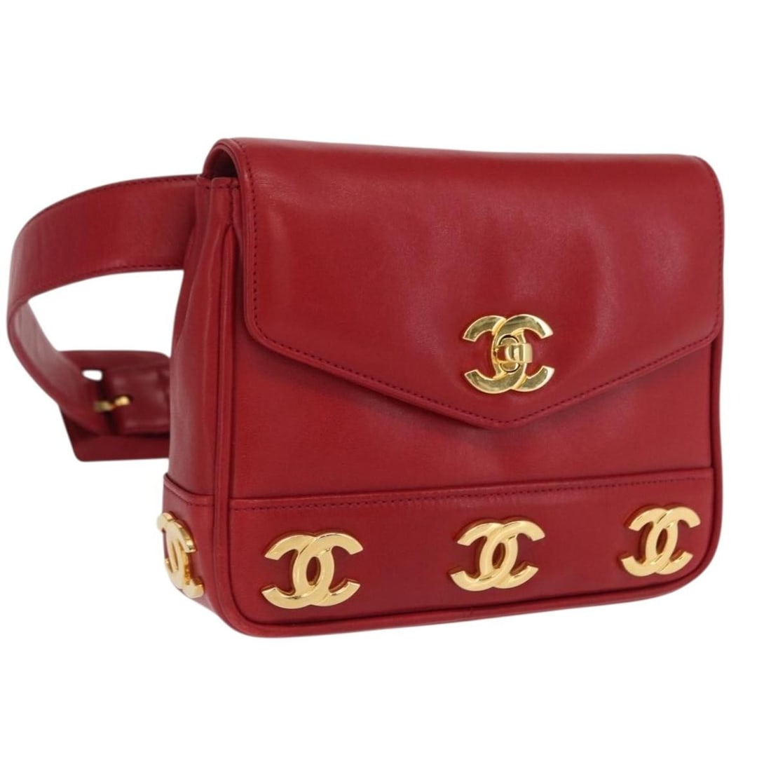 Red Lambskin CHANEL Triple Coco Waist Bag Gold Tone Hardware: Red Lambskin CHANEL Triple Coco Waist Bag Gold Tone Hardware This CHANEL Triple Coco waist bag is crafted from red lambskin leather with gold-tone hardware, featuring a compact design ideal for hands-