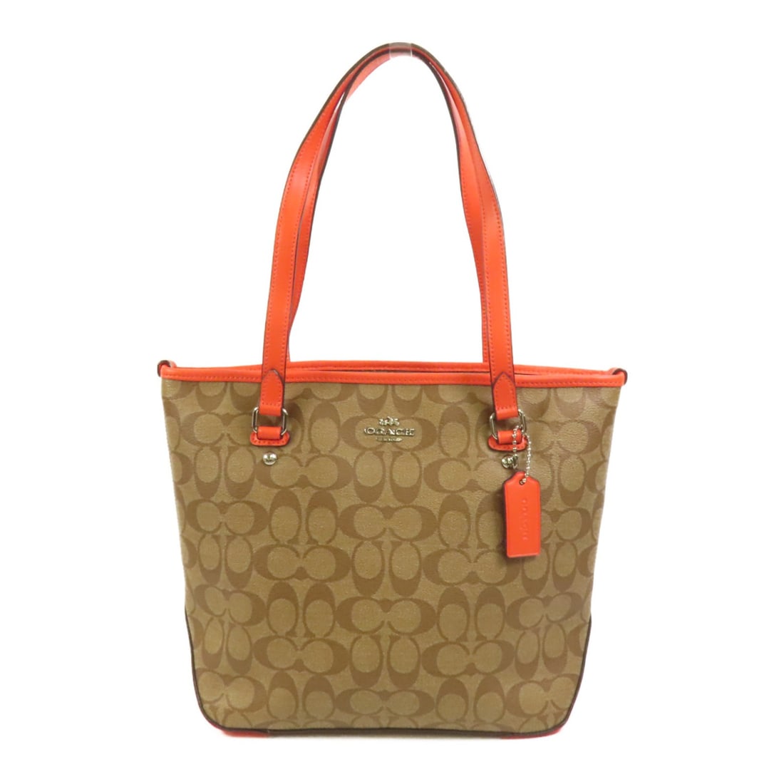 Coach Brown City Zip Tote PVC Coated Canvas Shoulder Bag: Coach Brown City Zip Tote PVC Coated Canvas Shoulder Bag This COACH City Zip Tote is crafted from brown PVC coated canvas and designed for women. The tote offers a practical style with a regular size,