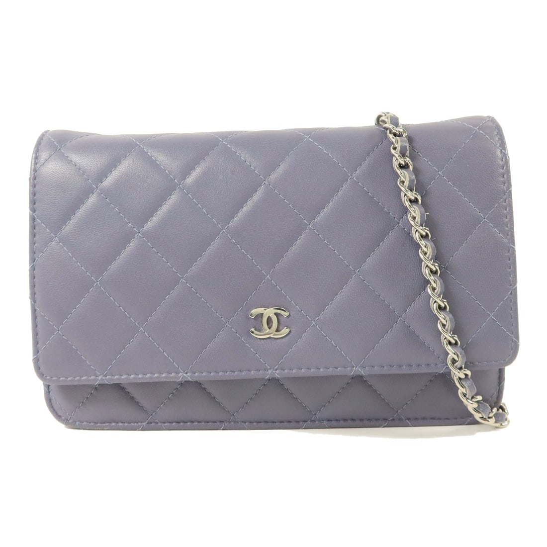 CHANEL Wallet on Chain Purple Lambskin Shoulder Bag: CHANEL Wallet on Chain Purple Lambskin Shoulder Bag This CHANEL Wallet On Chain shoulder bag is crafted from luxurious lambskin leather in a striking purple hue. Designed for women, it features a comp