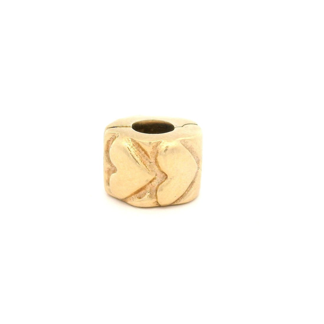 Pandora 14k Yellow Gold Retired Heart Clip Charm: Pandora 14k Yellow Gold Retired Heart Clip Charm This elegant Pandora Retired 14k Yellow Gold Simple Heart Clip Charm is crafted from solid 14k yellow gold. The charm features a timeless heart design,