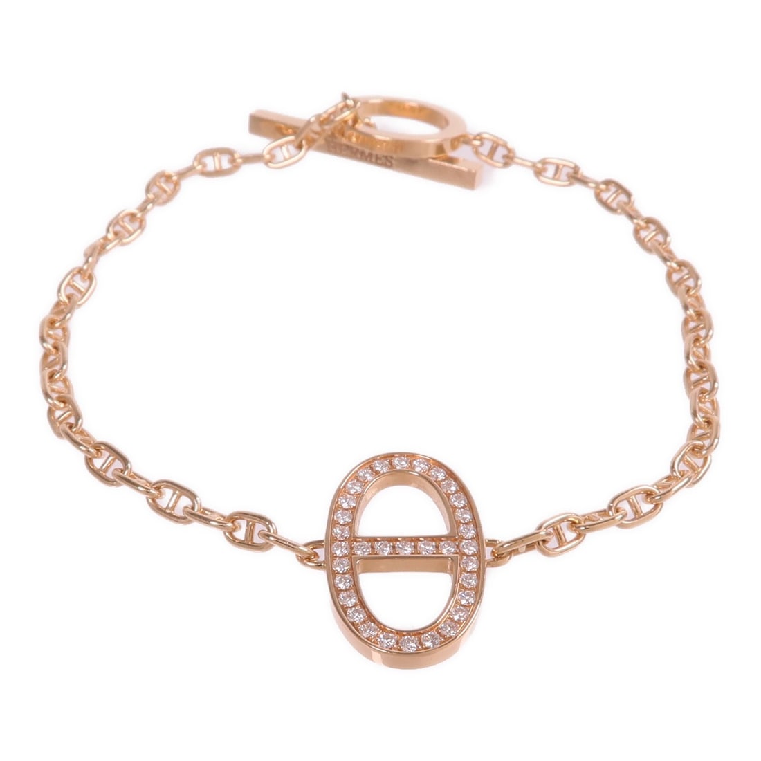 Chaine d'ancre Contour Rose Gold and Diamond Bracelet by Hermes: Chaine d'ancre Contour Rose Gold and Diamond Bracelet by Hermes This HERMES Chaine d'ancre Contour bracelet is crafted from 18K pink gold and features diamond accents. Designed for women, it showcases