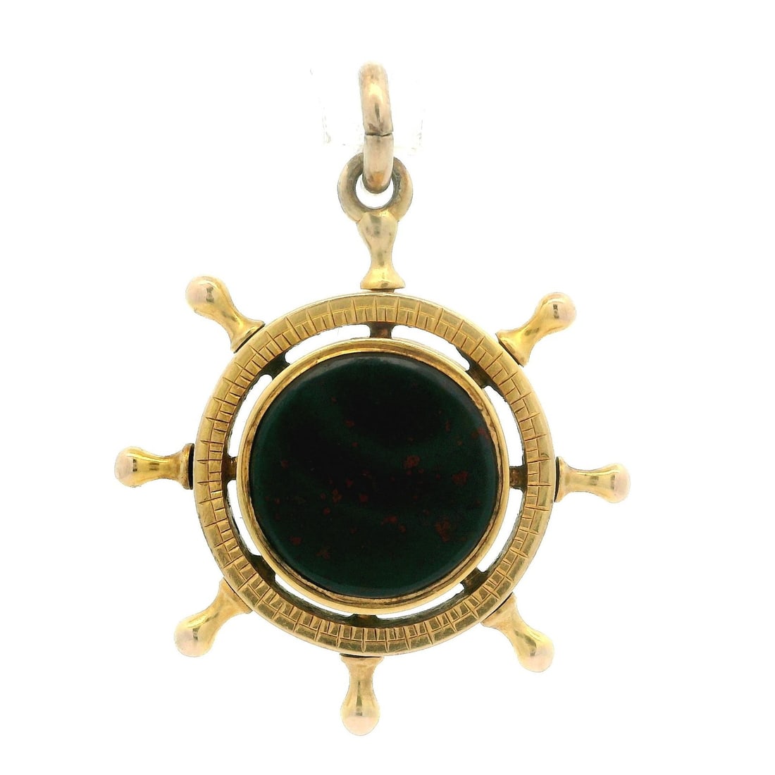 Vintage Yellow Gold Ship's Wheel Charm Pendant with Bloodstone and Sardonyx: Vintage Yellow Gold Ship's Wheel Charm Pendant with Bloodstone and Sardonyx This vintage charm pendant features a unique ship's wheel design crafted from solid 14k yellow gold, complemented by a 9k ye