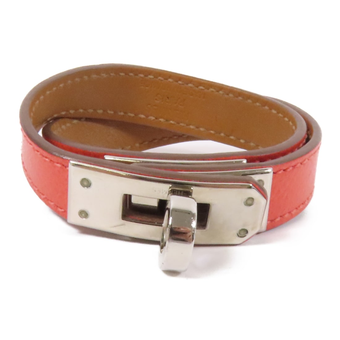 HERMES Kelly Double Tour Bracelet Epsom Leather Pink PHW: HERMES Kelly Double Tour Bracelet Epsom Leather Pink PHW This elegant HERMES Kelly Double Tour Bracelet is crafted from high-quality Epsom leather in a stunning pink color. The bracelet features a sty