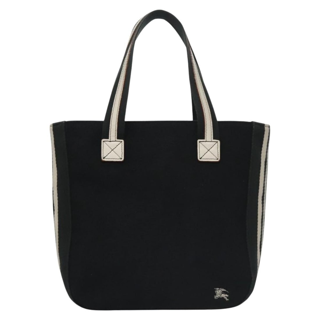 Blue Label canvas tote by Burberry in black 30cm: Blue Label canvas tote by Burberry in black 30cm This Burberry Blue Label tote bag is crafted from sturdy black canvas and designed for women. The bag features a spacious main compartment with interio