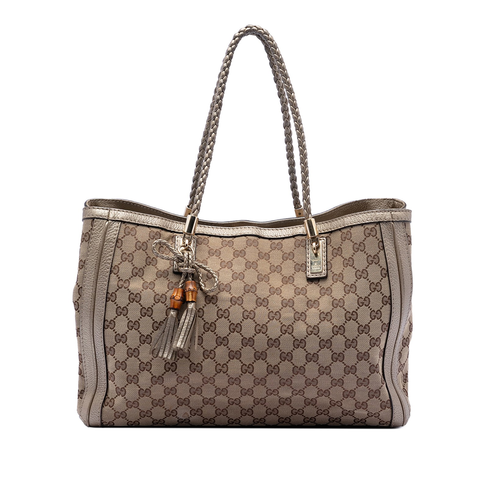 Gucci Bella Tote Medium GG Canvas Beige Leather Trim Braided Strap: Gucci Bella Tote Medium GG Canvas Beige Leather Trim Braided Strap This Gucci Medium GG Canvas Bella Tote showcases a canvas body with leather trim and braided leather straps featuring tassel detail. 