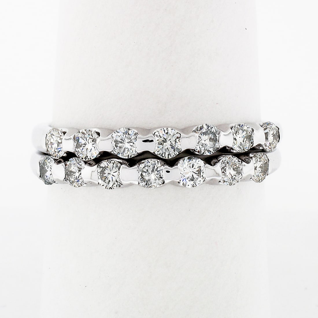 Elegant 14k White Gold Diamond Band Guard Rings Set 1.00ctw: Elegant 14k White Gold Diamond Band Guard Rings Set 1.00ctw This stunning pair of ring guard bands is crafted from solid 14k white gold and features a total of 14 natural round brilliant cut diamonds,