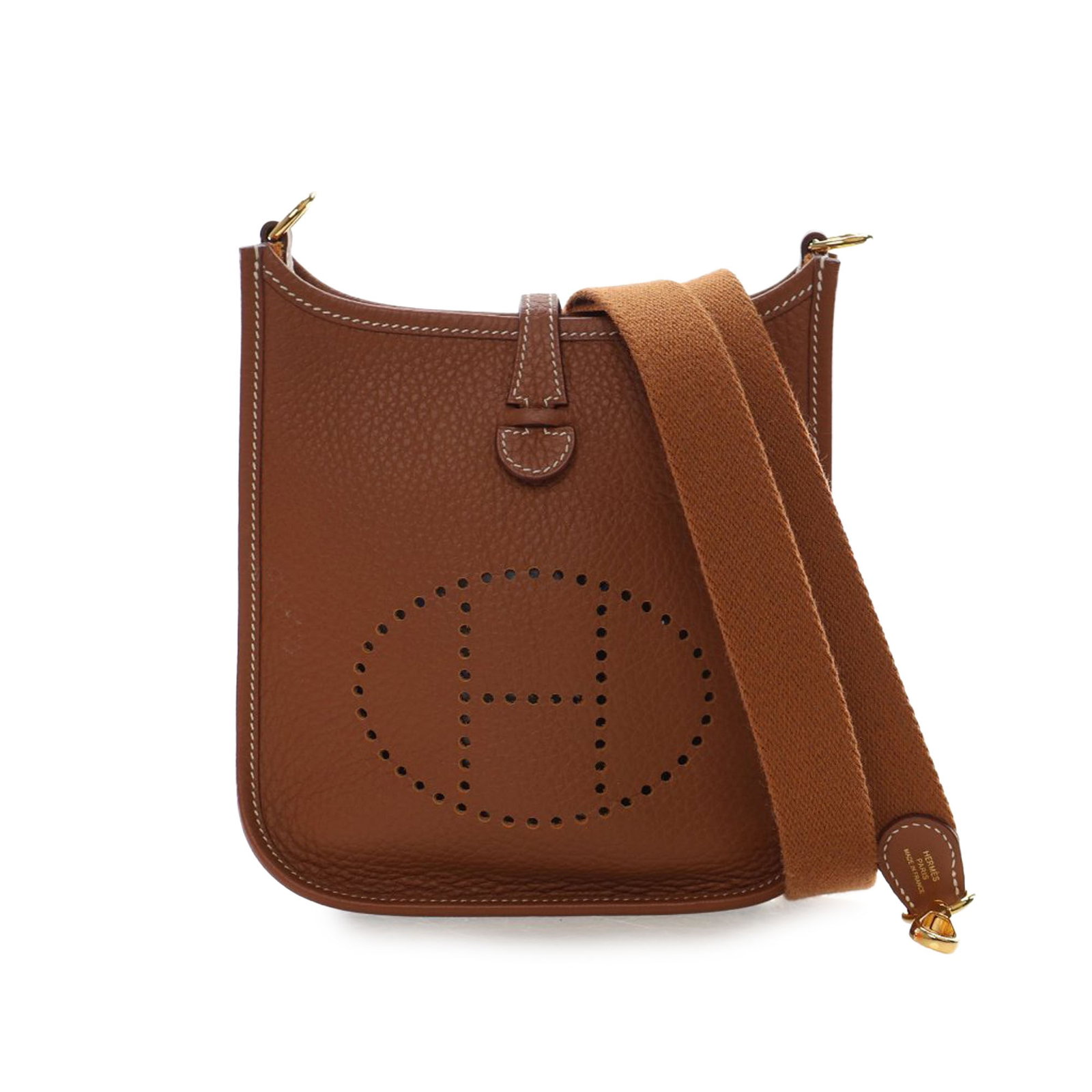 Hermes Evelyne TPM 16 Gold Togo Leather Crossbody Bag: Hermes Evelyne TPM 16 Gold Togo Leather Crossbody Bag The Hermes Evelyne TPM 16 features a Togo leather body in gold color, complemented by a detachable flat canvas strap and an open top with a strap 