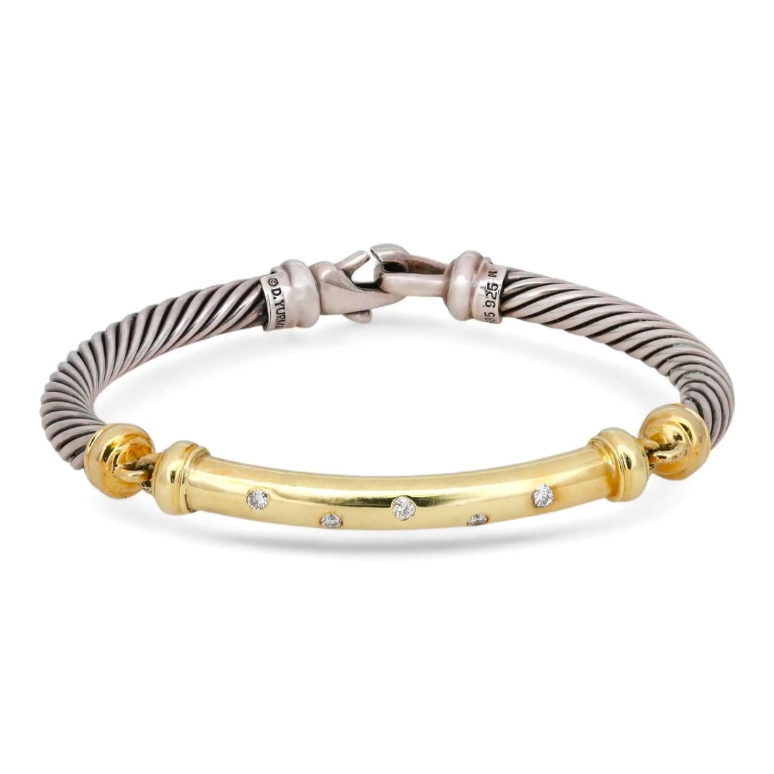 Two Tone Diamond Bangle in 14K Gold and Sterling Silver by David Yurman: Two Tone Diamond Bangle in 14K Gold and Sterling Silver by David Yurman This David Yurman bracelet is a sophisticated bangle crafted from 14K yellow gold and 925 sterling silver. It showcases a signat