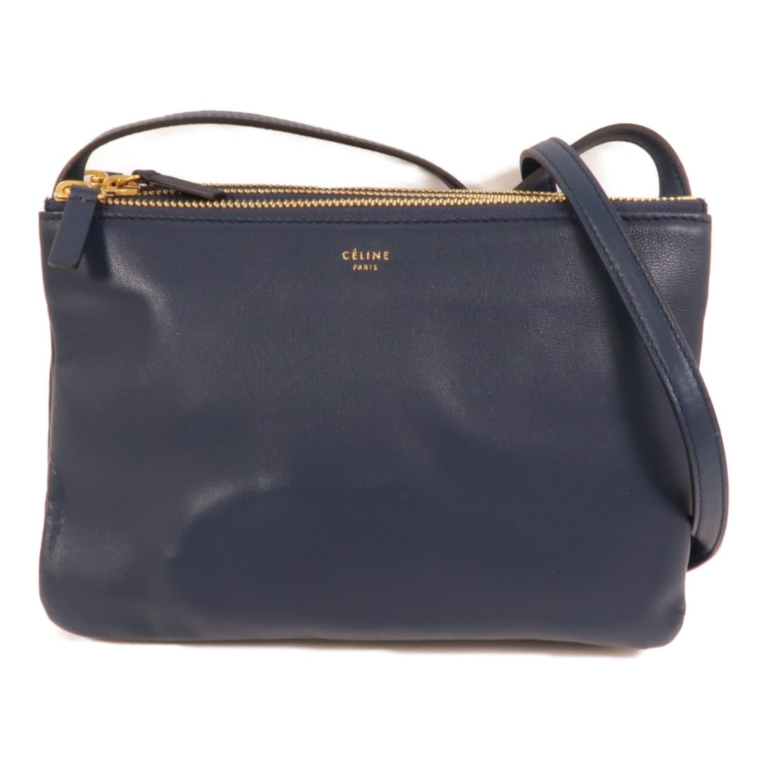 CELINE Trio Navy Lambskin Shoulder Bag GHW: CELINE Trio Navy Lambskin Shoulder Bag GHW This CELINE Trio Small Shoulder Bag is crafted from luxurious lambskin leather in a sophisticated navy color. Designed for women, it features a compact silho