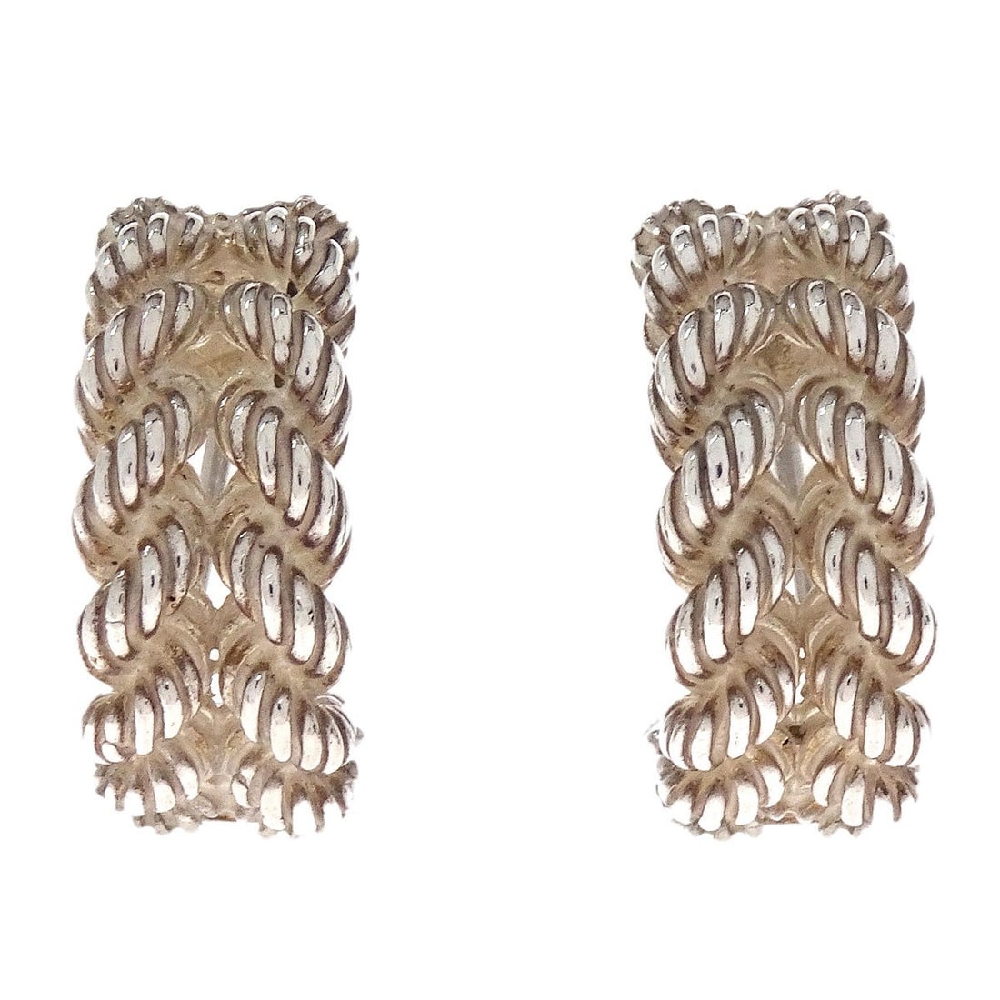Hoop Clip-On Earrings by Hermes in 925 Silver: Hoop Clip-On Earrings by Hermes in 925 Silver These Hermes clip-on hoop earrings are crafted from 925 silver, offering a classic and elegant look. Designed without stones, they feature a secure clip-o