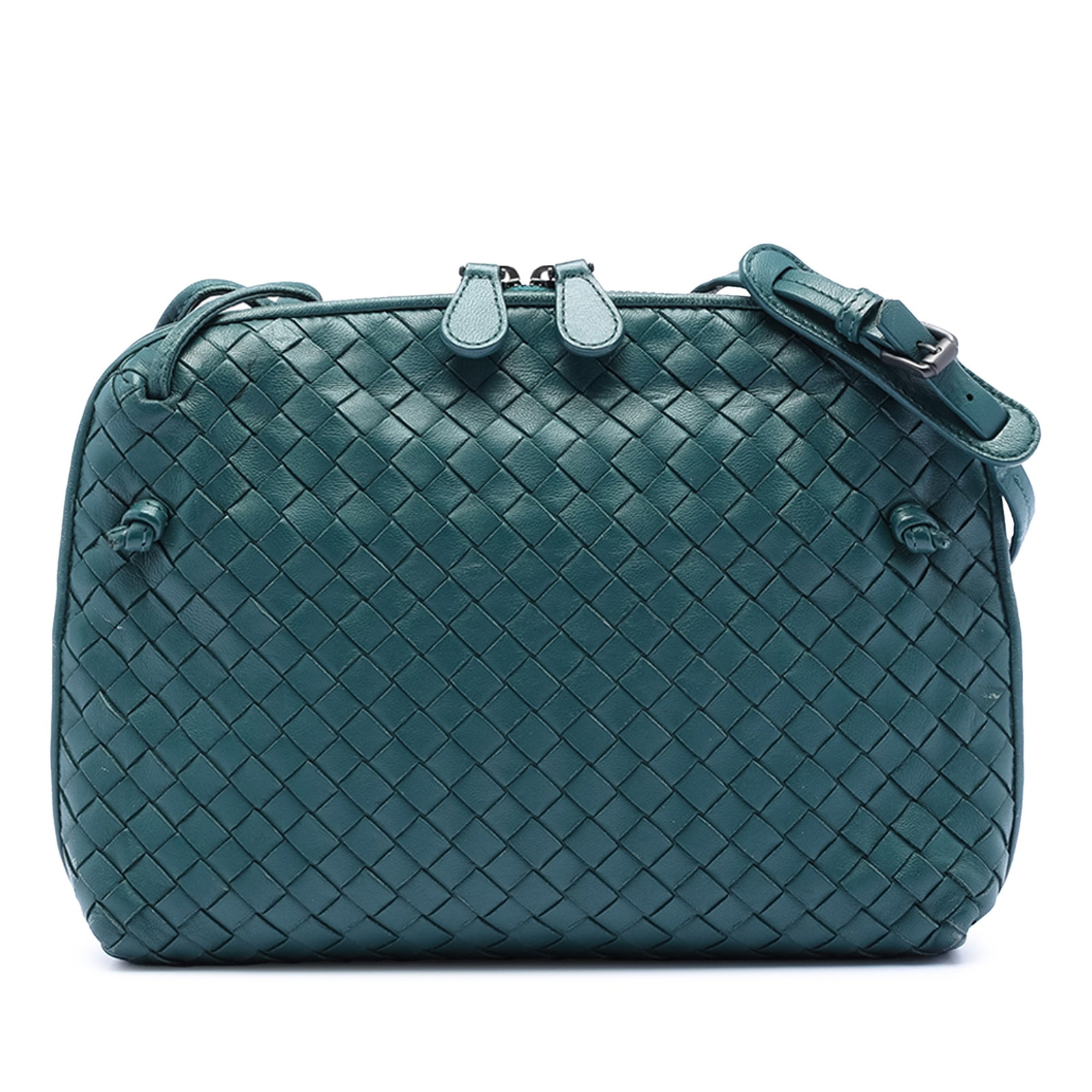Blue Nappa Leather Nodini Woven Crossbody Bag by Bottega Veneta: Blue Nappa Leather Nodini Woven Crossbody Bag by Bottega Veneta This Bottega Veneta Nodini crossbody bag showcases the brand's signature woven leather design. It features a flat leather strap, a top z