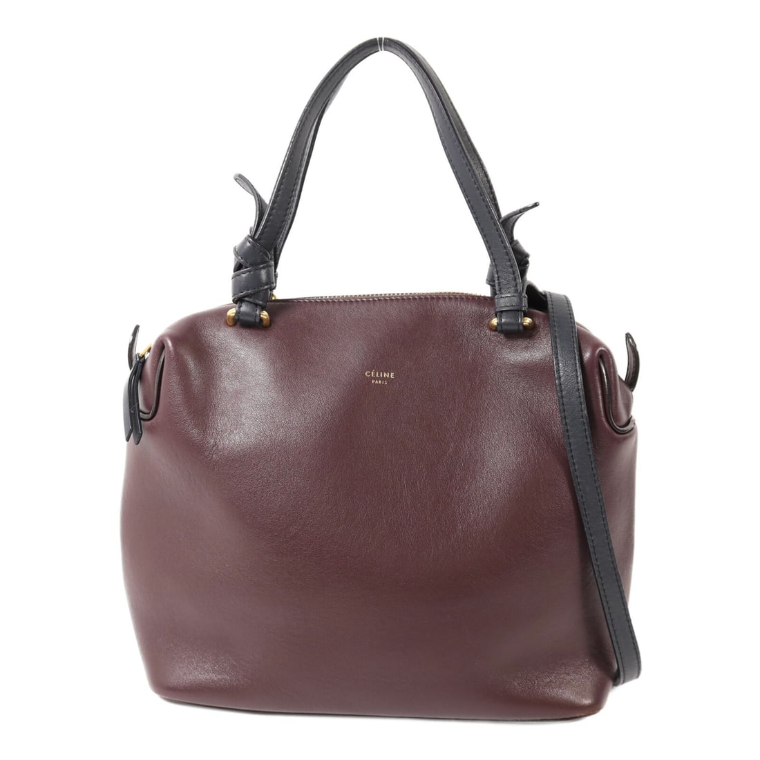 Celine Soft Cube Calfskin Leather Shoulder Bag Navy and Burgundy GHW: Celine Soft Cube Calfskin Leather Shoulder Bag Navy and Burgundy GHW This CELINE Soft Cube 2-way shoulder bag features a sophisticated navy exterior crafted from calfskin leather with burgundy accents