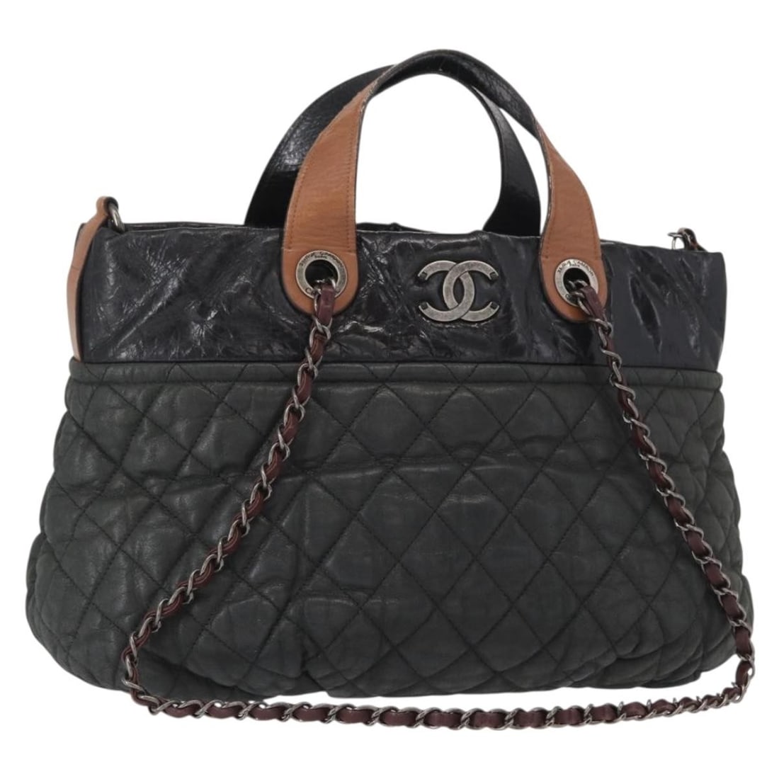 Chanel In The Mix Black Iridescent Quilted Calfskin Tote Bag: Chanel In The Mix Black Iridescent Quilted Calfskin Tote Bag The Chanel In The Mix Tote features quilted iridescent calfskin leather in black, designed for women. This pre-owned handbag shows signific