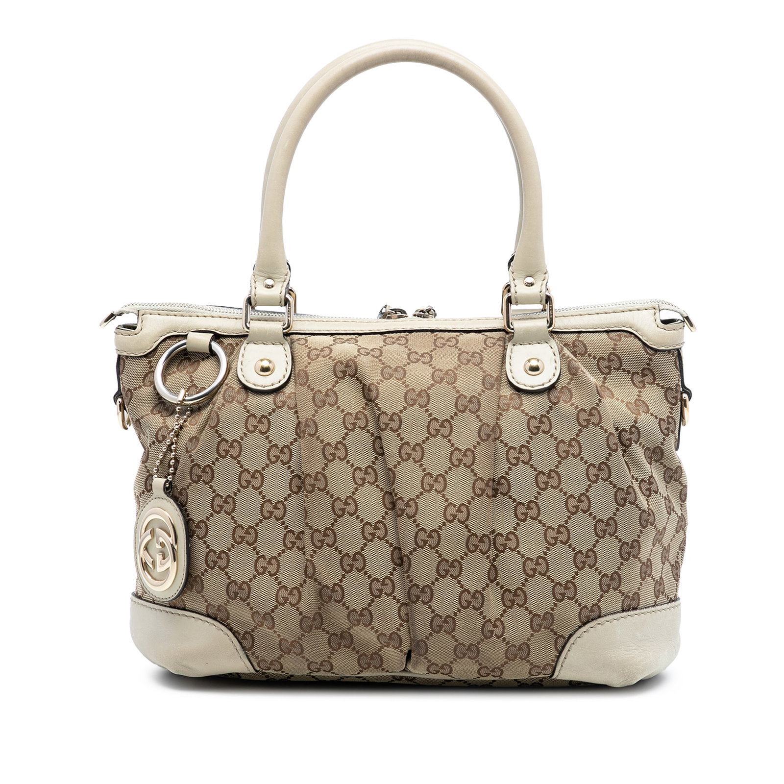 Beige GG Canvas Sukey Handbag with Leather Trim by Gucci: Beige GG Canvas Sukey Handbag with Leather Trim by Gucci This Gucci GG Canvas Sukey Satchel features a canvas body with leather trim, rolled leather handles, a flat leather strap, a top zip closure, a