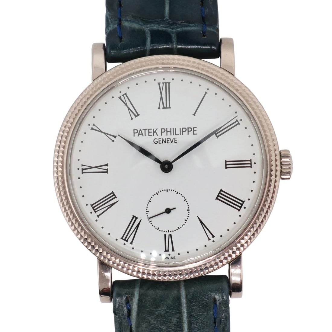 Patek Philippe Calatrava 31mm 18K White Gold Luxury Watch 7119G: Patek Philippe Calatrava 31mm 18K White Gold Luxury Watch 7119G Discover the elegance of the Patek Philippe Calatrava, a luxurious wristwatch crafted from 18K white gold. This exquisite timepiece feat
