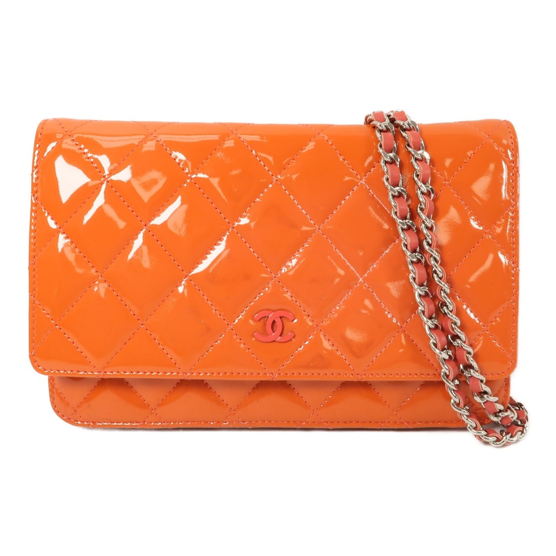 CHANEL Patent Leather Orange WOC Shoulder Bag: CHANEL Patent Leather Orange WOC Shoulder Bag This CHANEL Wallet On Chain (WOC) shoulder bag features a vibrant orange patent leather exterior and silver-tone hardware. Designed for women, it offers a