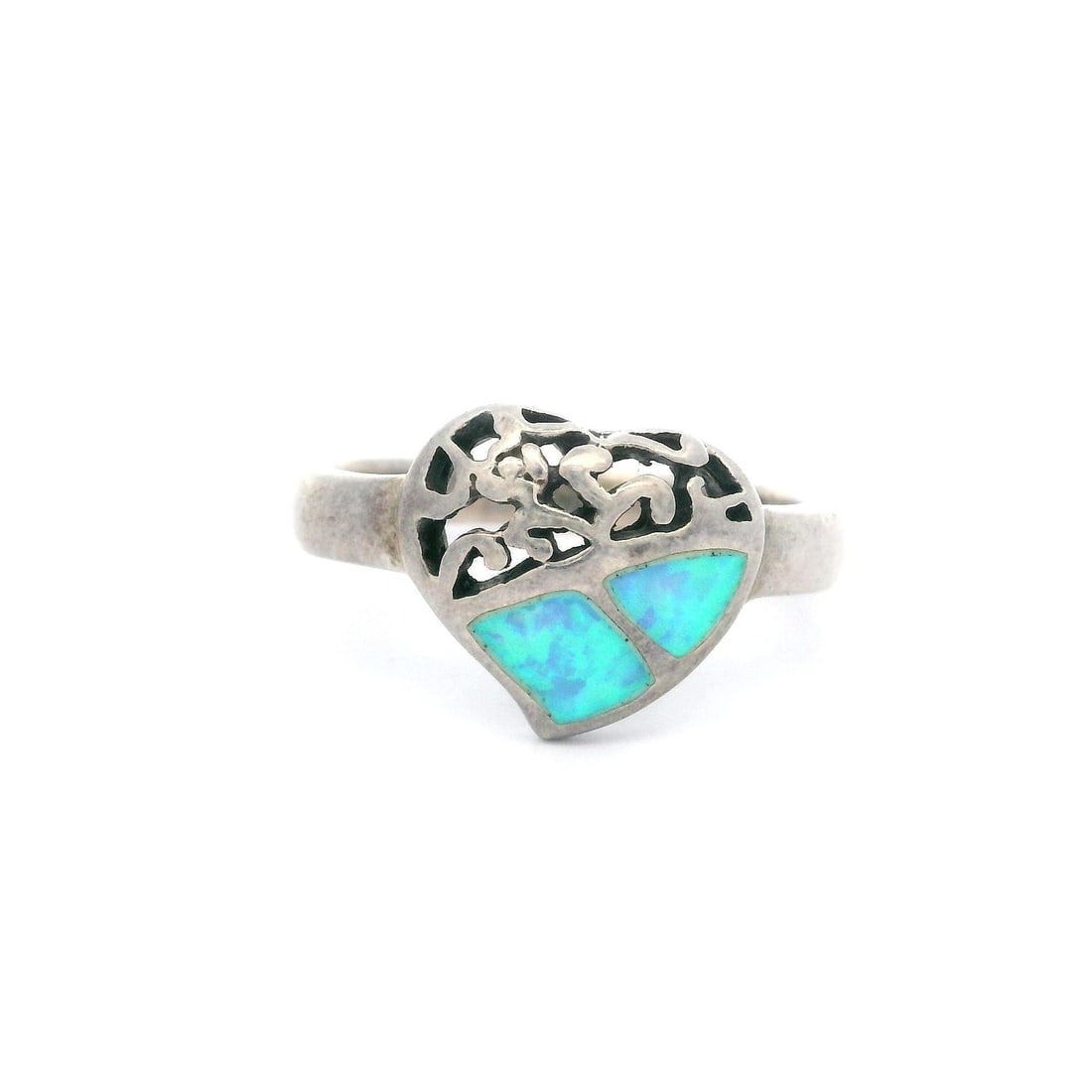 Vintage Sterling Silver Inlaid Opal Heart Scroll Work Ring Size 8: Vintage Sterling Silver Inlaid Opal Heart Scroll Work Ring Size 8 This exquisite vintage ring showcases a stunning synthetic opal heart inlay, featuring a captivating blue base with green and orange c